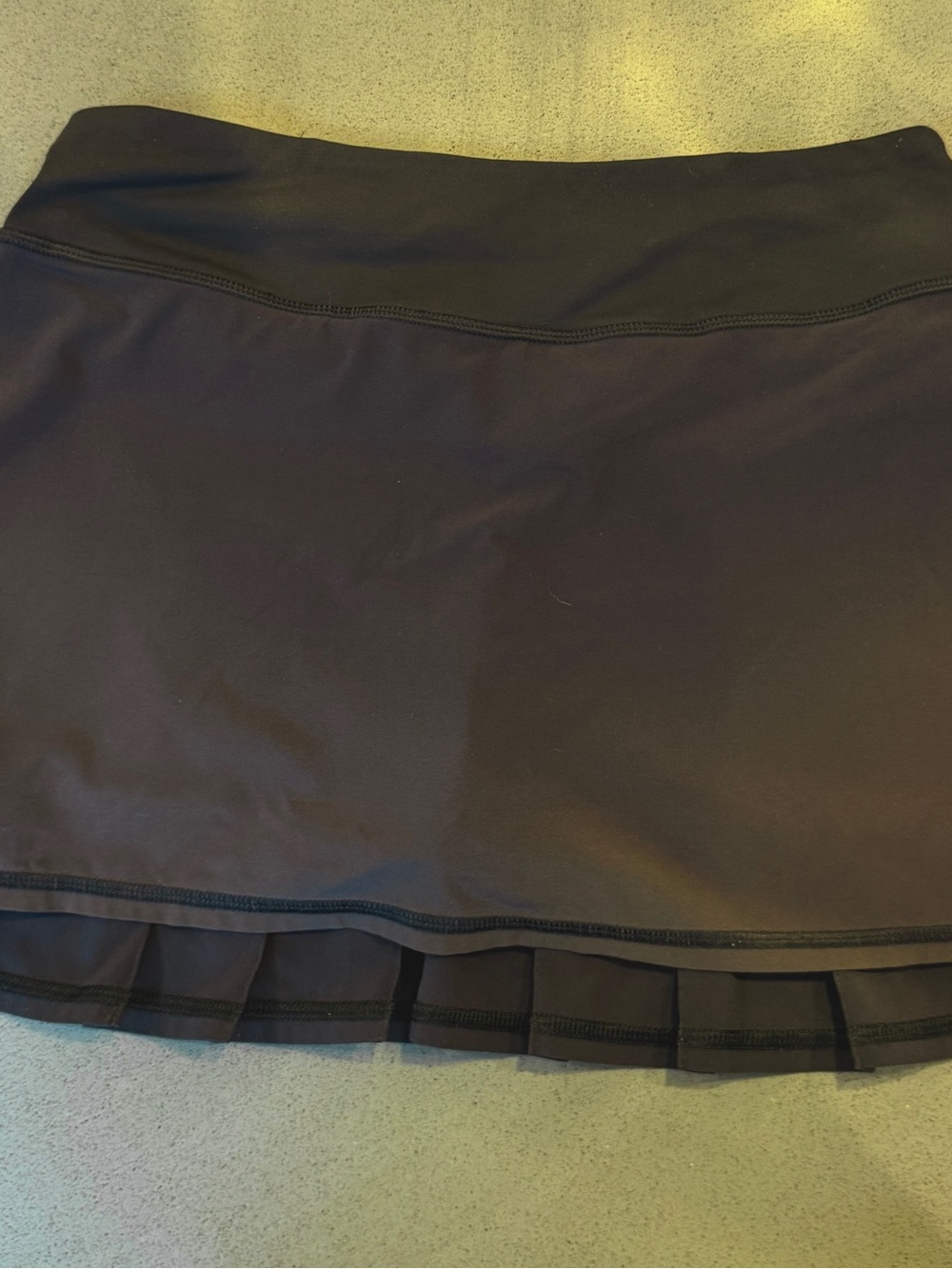 2 Lululemon tennis skirts, black and white